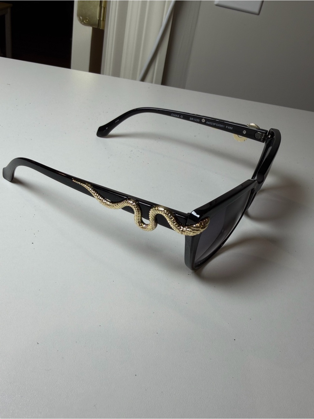 Foster Grant Black Sunglasses with Gold Snake Accent Chic Classic